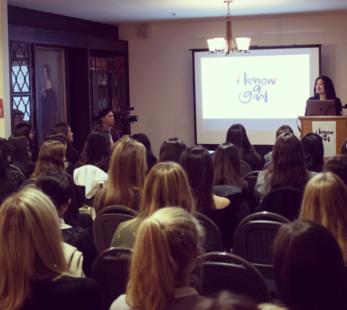 Cindy Huang presenting at “I Know a Girl” seminar on empowering women.